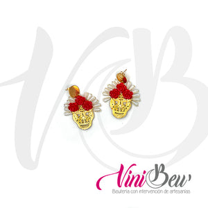 Aretes calavera de chapa con resplandor