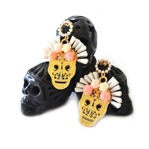 Aretes calavera de chapa con resplandor